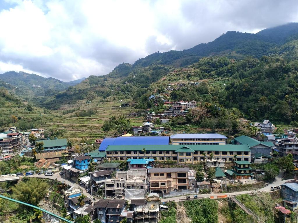 an aerial view of a town in a mountain at Koreen Guest House in Banaue