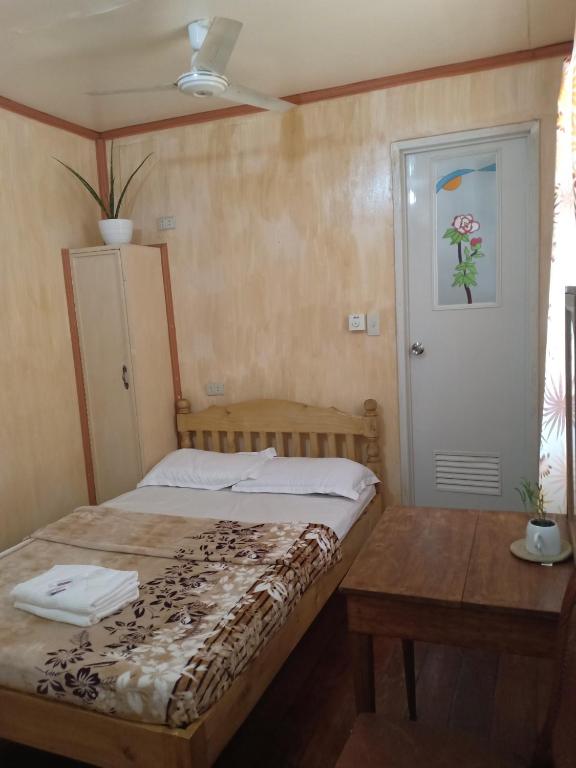 Postel nebo postele na pokoji v ubytování Koreen Guest House