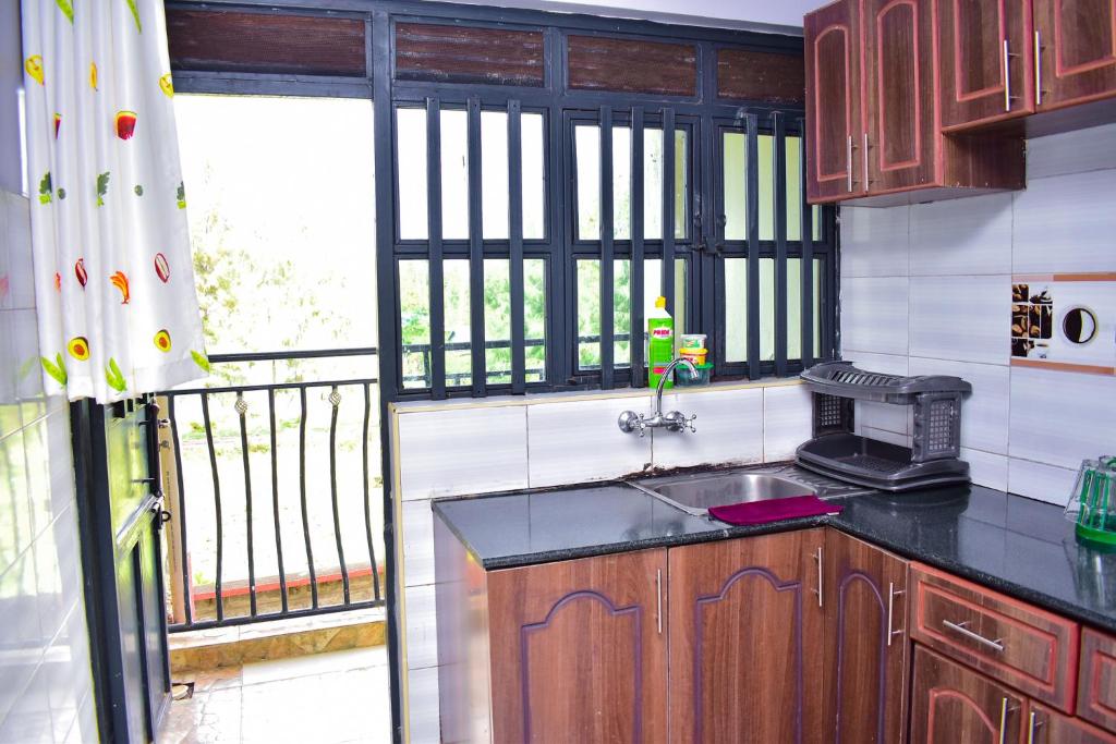 Kuchyň nebo kuchyňský kout v ubytování Bomani -3 Nati Apartment
