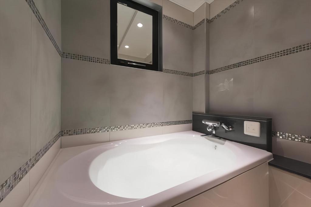 Koupelna v ubytování HOTEL REFRAIN