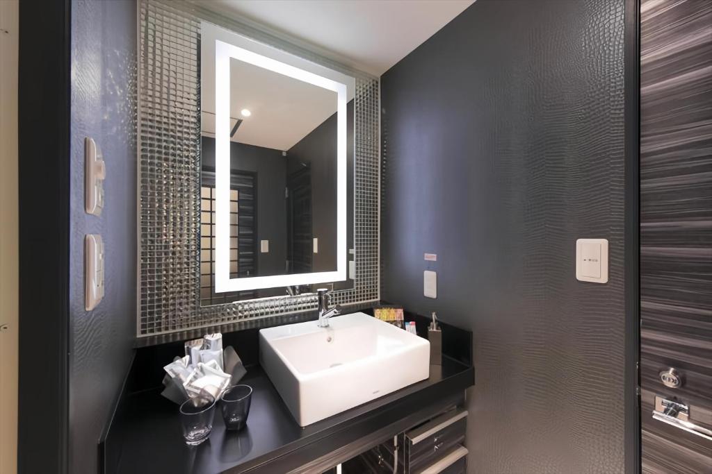 Koupelna v ubytování HOTEL REFRAIN