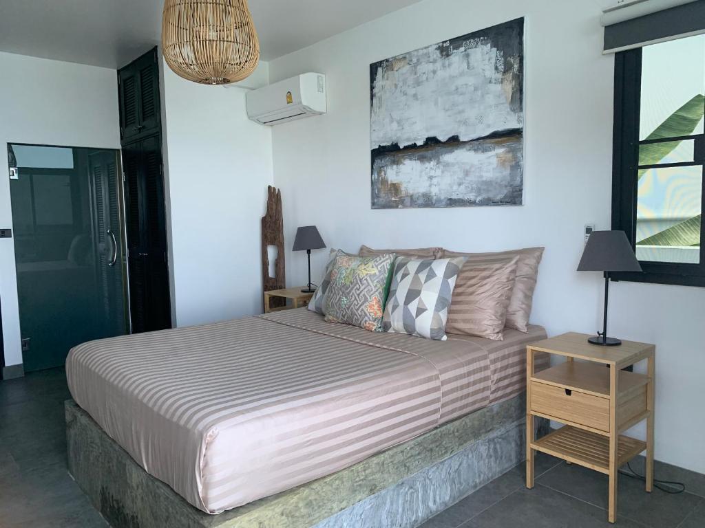 Postel nebo postele na pokoji v ubytování Karma Luxury Villa