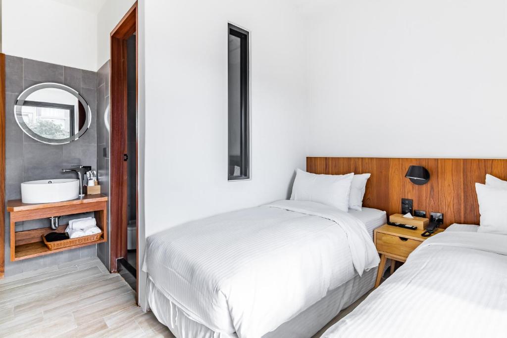 A bed or beds in a room at Kenting Sea Wall 112