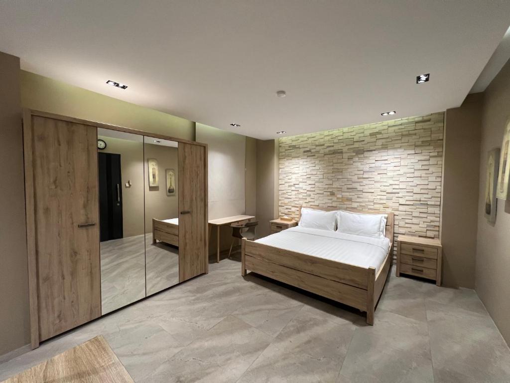 Una cama o camas en una habitación de Choska Residence