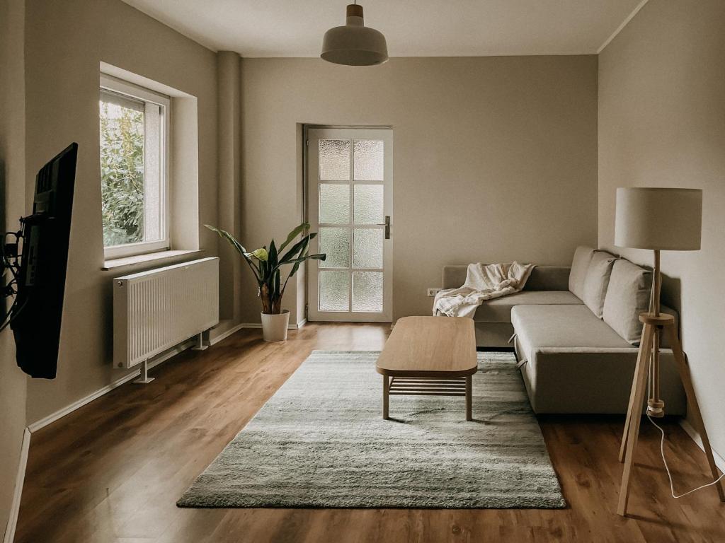 Posezení v ubytování Gemütliche 93m² Wohlfühlfläche mit Ausblick zum Weltkulturerbe!