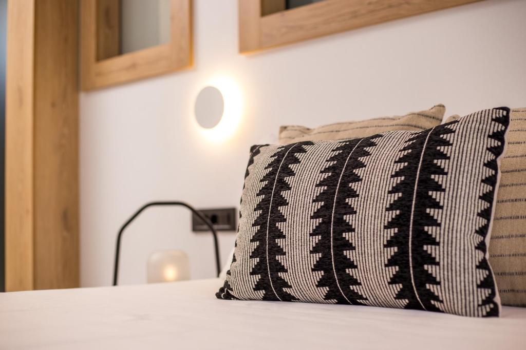 Postel nebo postele na pokoji v ubytování Cactus Suites