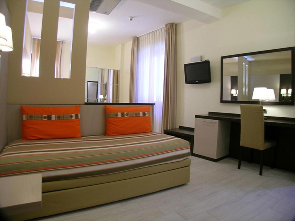 Postel nebo postele na pokoji v ubytování Albergo La Marina B&B