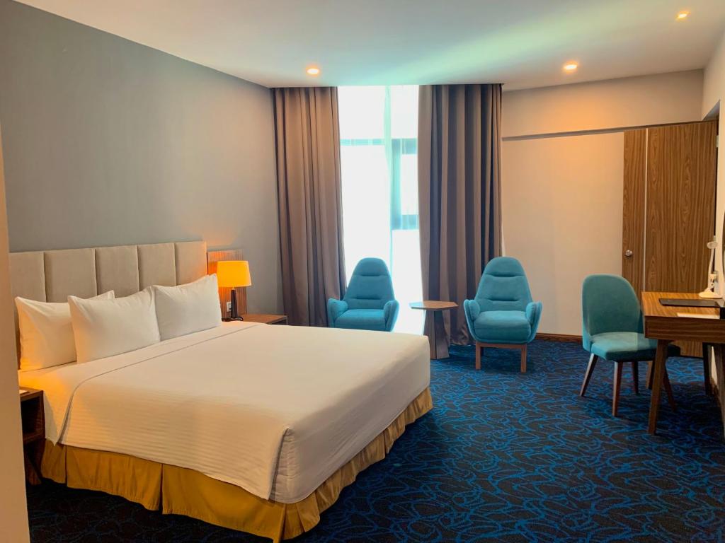 Giường trong phòng chung tại Muong Thanh Luxury Vien Trieu Nha Trang