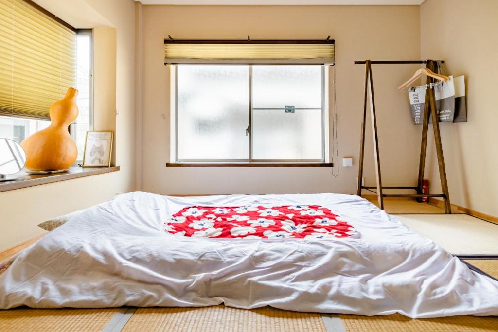 Postel nebo postele na pokoji v ubytování Dat's house