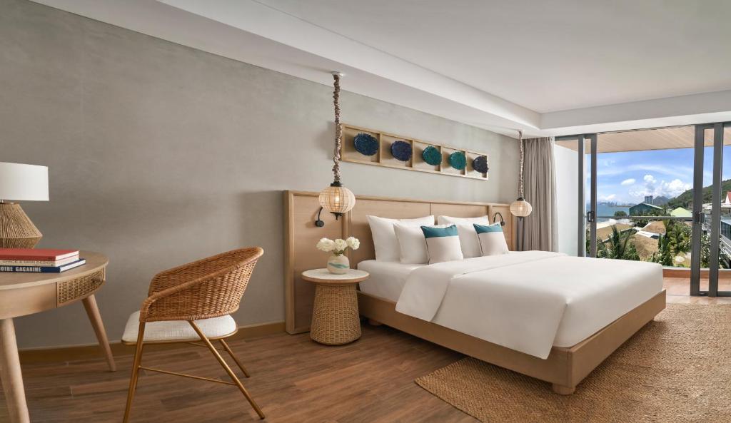 Giường trong phòng chung tại Boma Resort Nha Trang