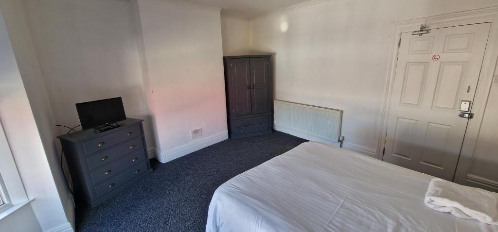 Postel nebo postele na pokoji v ubytování APARTMENT in CENTRAL DONCASTER