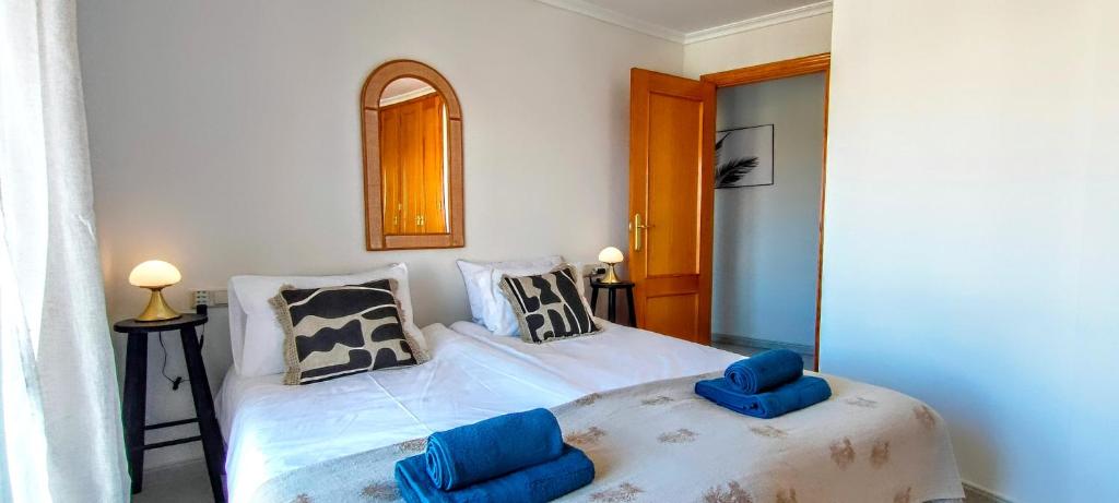 Postel nebo postele na pokoji v ubytování Happy Holiday Apartment Javea , 2 bed 2 bath , seaview airco wifi