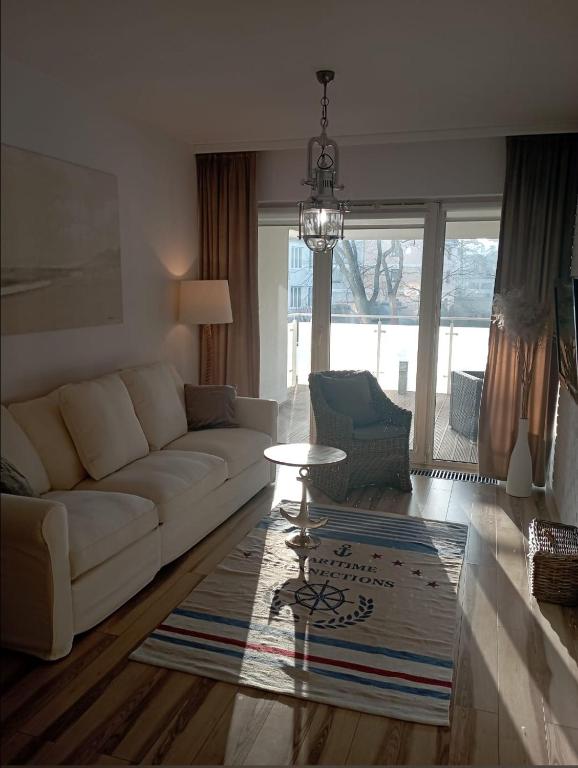 Posedenie v ubytovaní Apartament Riviera z tarasem - Playa Baltis