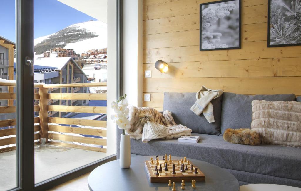 Гостиная зона в Appart'Hôtel Prestige Odalys L'Eclose