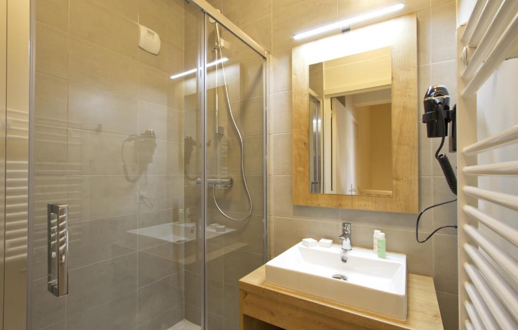 Ванная комната в Résidence Prestige Odalys l'Éclose