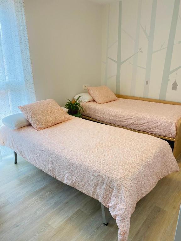 Posteľ alebo postele v izbe v ubytovaní Apartamento Donostia San Sebastian