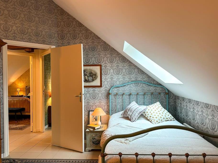 Posteľ alebo postele v izbe v ubytovaní La Souveraine - Cottage - Château Le Bas Bleu