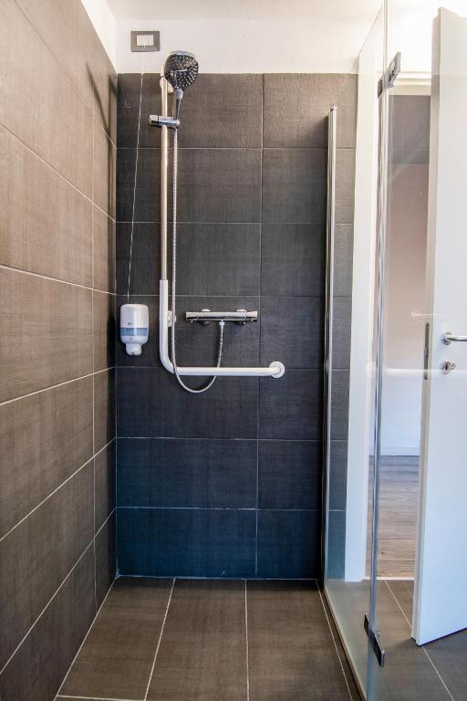 Koupelna v ubytování Hotel Saligari