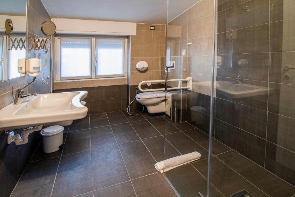 Koupelna v ubytování Hotel Saligari
