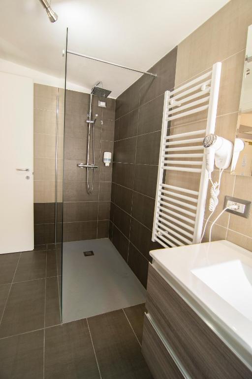Koupelna v ubytování Hotel Saligari