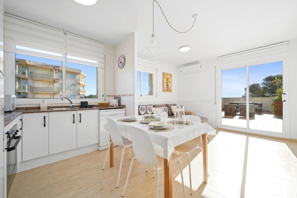 Kuchyň nebo kuchyňský kout v ubytování Hauzify I Apartament Mediterrani