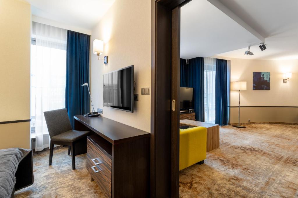 TV a/nebo společenská místnost v ubytování Qubus Hotel Kielce