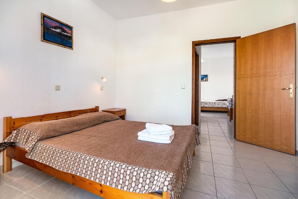 A bed or beds in a room at Acapulco 6