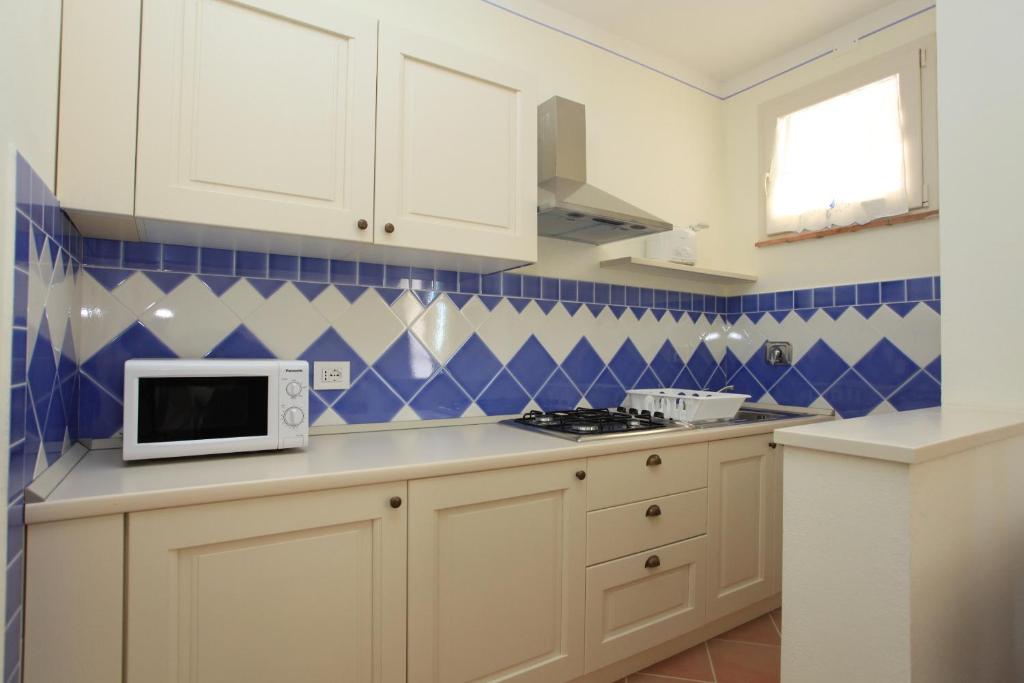 Kuchyň nebo kuchyňský kout v ubytování Agriturismo Campallegro