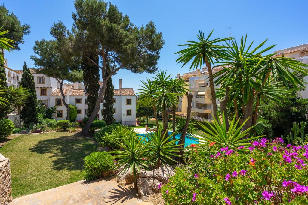 The swimming pool at or close to Cozy apartment with pool in Riviera del Sol by Costarentals - Ref 153