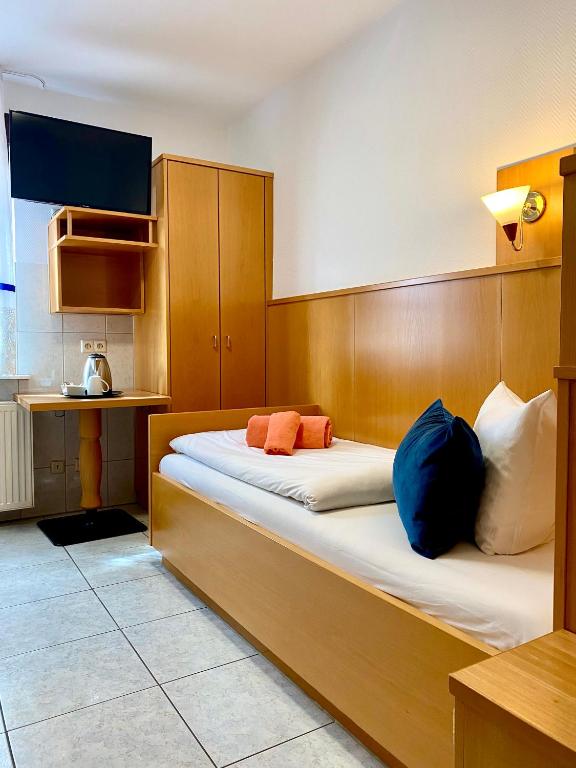 Postel nebo postele na pokoji v ubytování M-Hotel