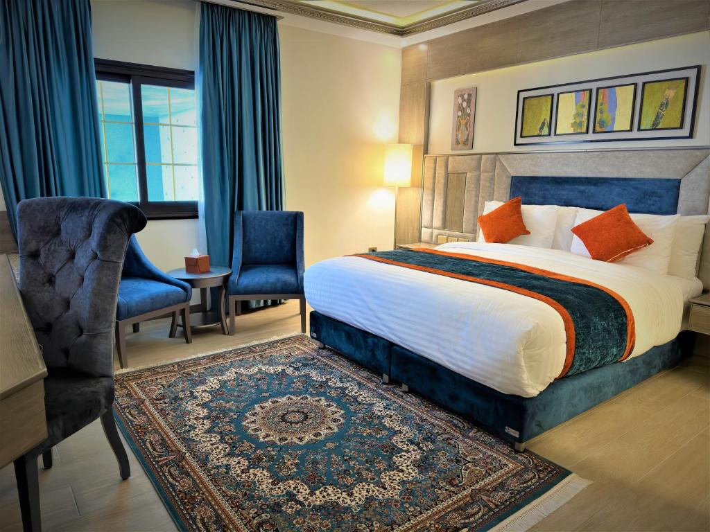Postel nebo postele na pokoji v ubytování Petra Canyon Hotel