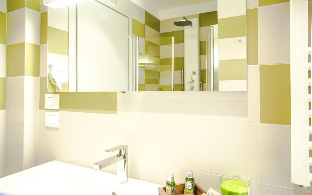 Koupelna v ubytování Privilege Apartments