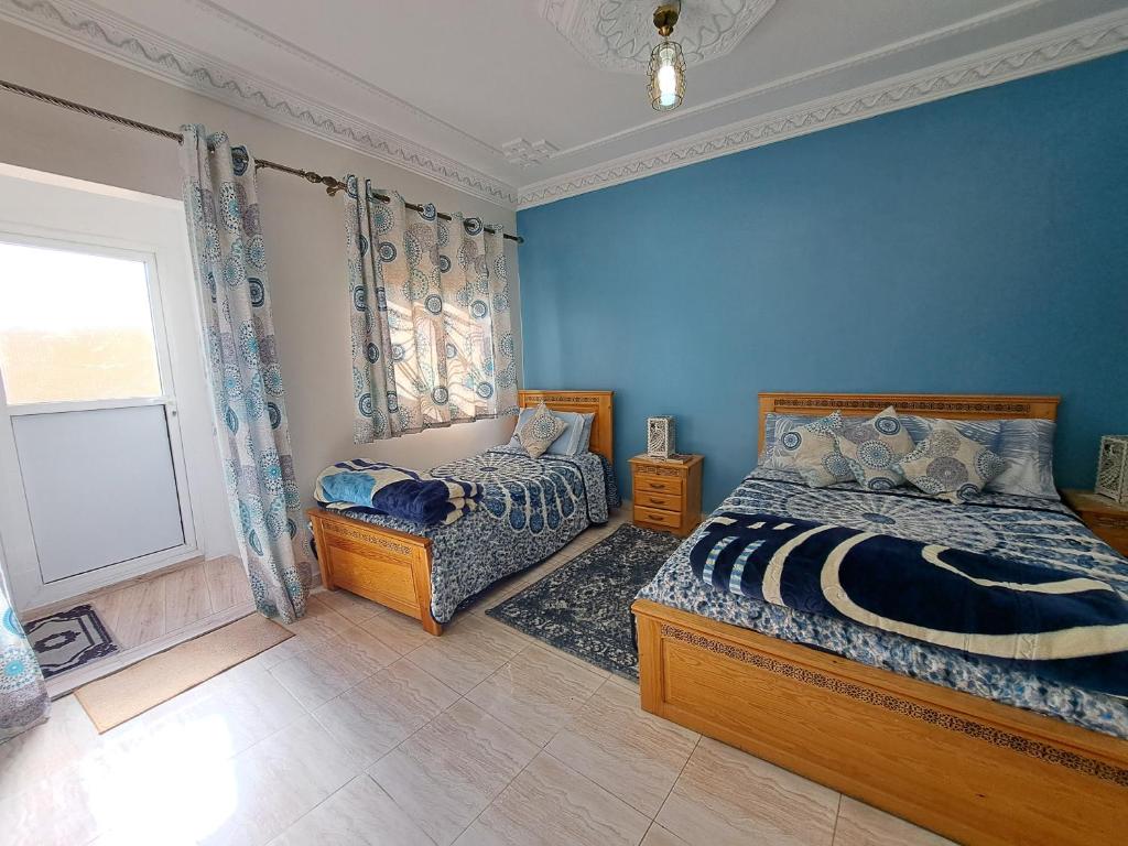 Postel nebo postele na pokoji v ubytování Diafa Stay