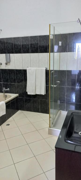 Koupelna v ubytování Hotel Savana