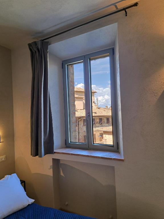 Postel nebo postele na pokoji v ubytování Casa Mustiola