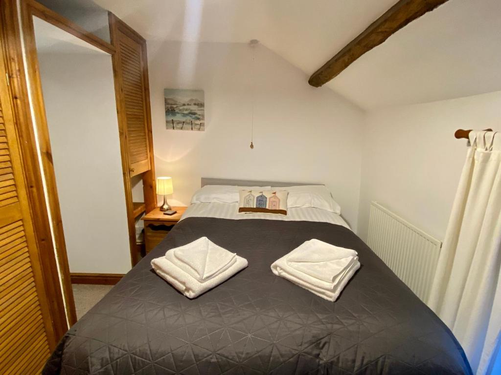 Postel nebo postele na pokoji v ubytování Seven Stars Inn