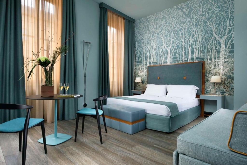 Postel nebo postele na pokoji v ubytování Villa Appiani Hotel