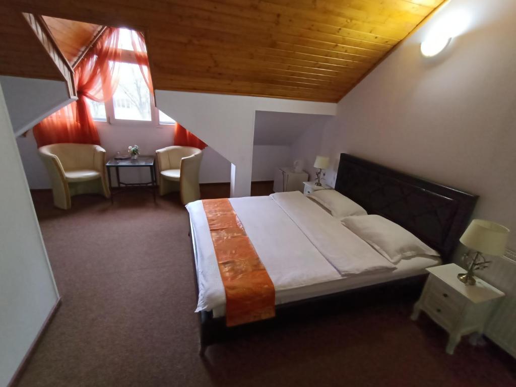 Postel nebo postele na pokoji v ubytování Pension Casa Samurai