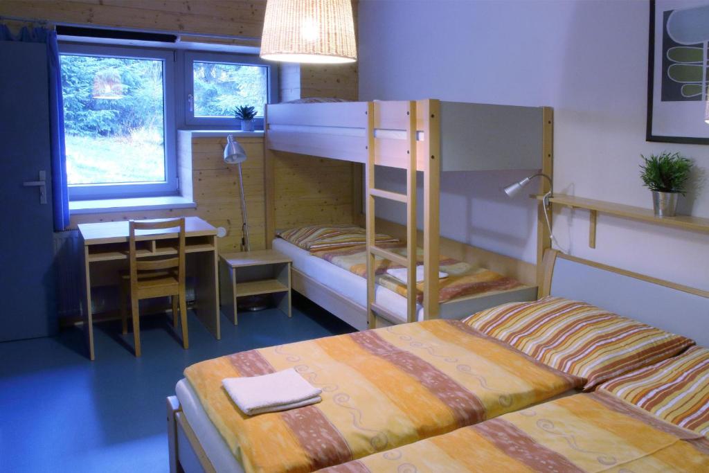 Postel nebo postele na pokoji v ubytování Chata H&D Červenohorské Sedlo