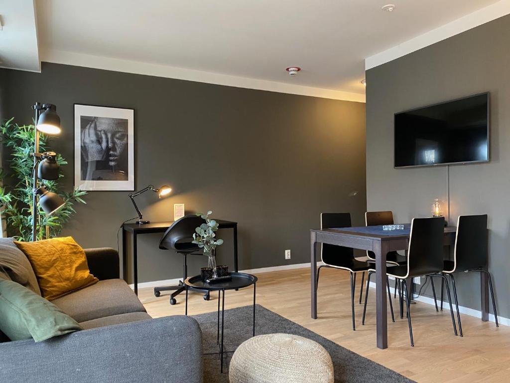 TV a/nebo společenská místnost v ubytování Magnolia House Norrviken