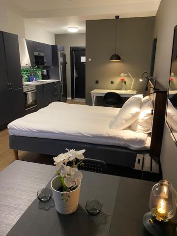 Postel nebo postele na pokoji v ubytování Magnolia House Norrviken