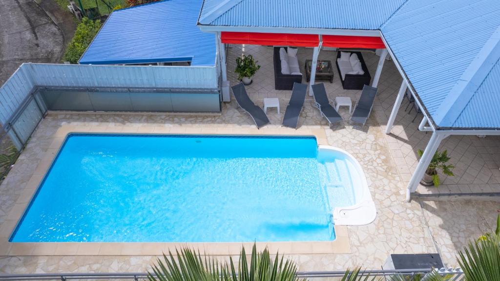 Bazén v ubytování Villa K'Line - Piscine privée, magnifique vue mer aux Trois-Ilets nebo v jeho okolí