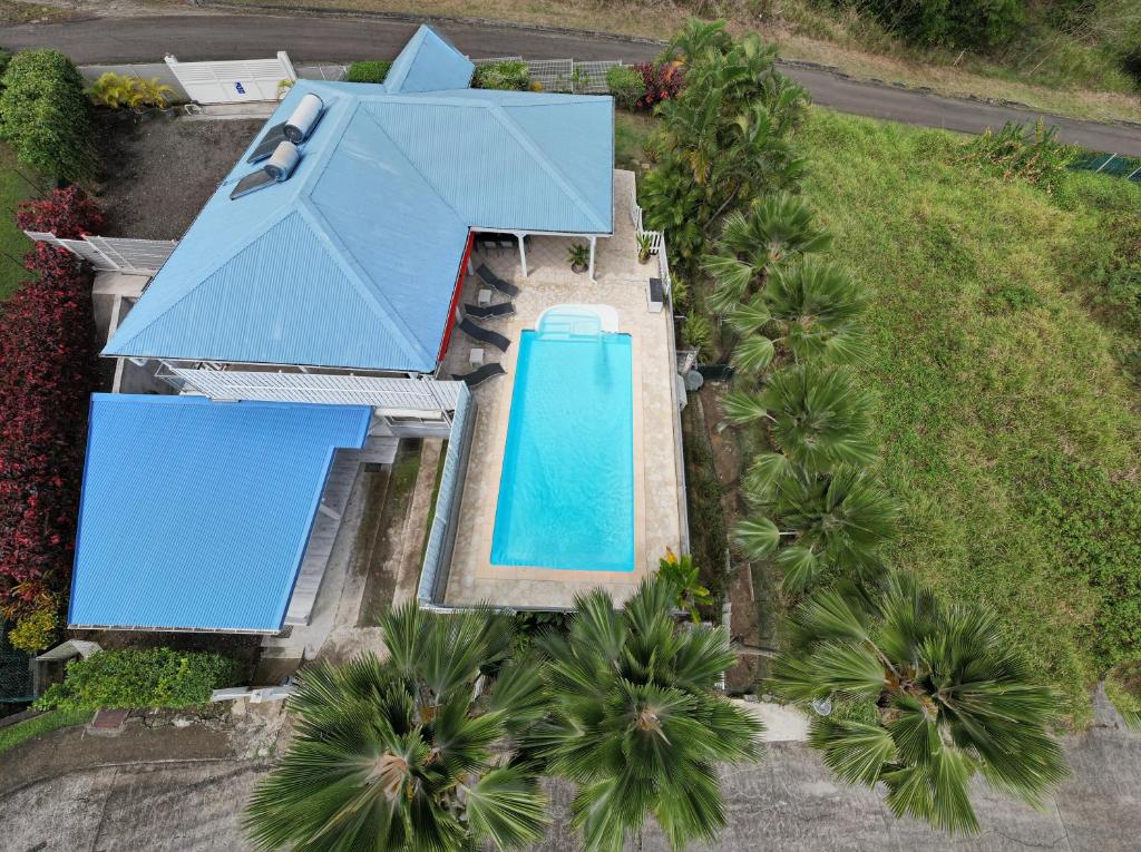 Bazén v ubytování Villa K'Line - Piscine privée, magnifique vue mer aux Trois-Ilets nebo v jeho okolí