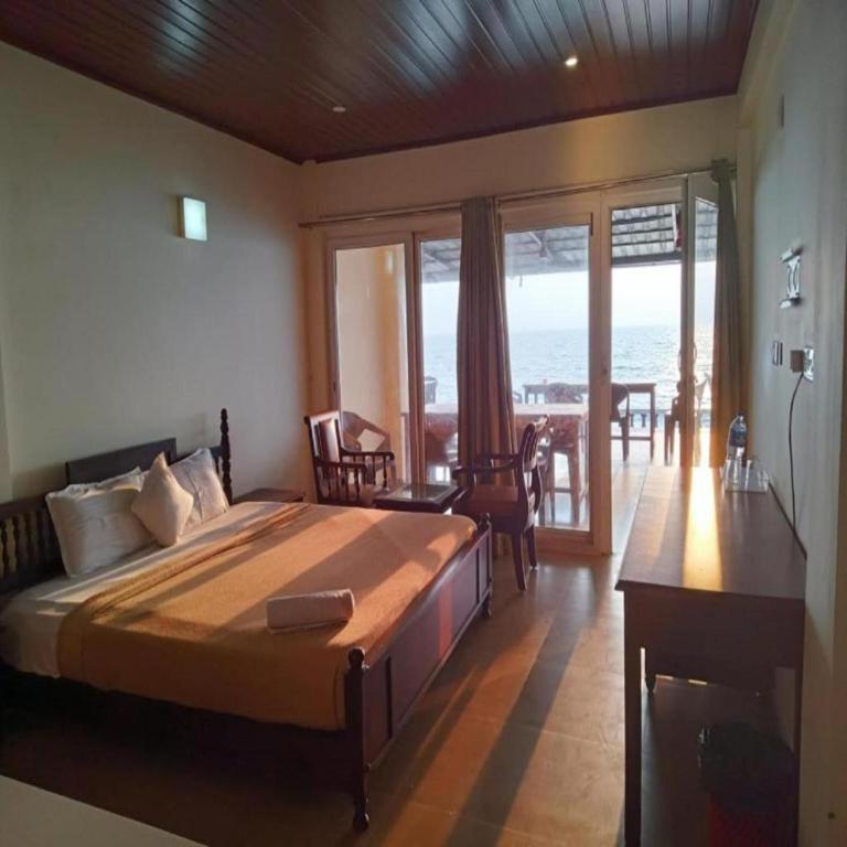Postel nebo postele na pokoji v ubytování Baywatch Beach Homes
