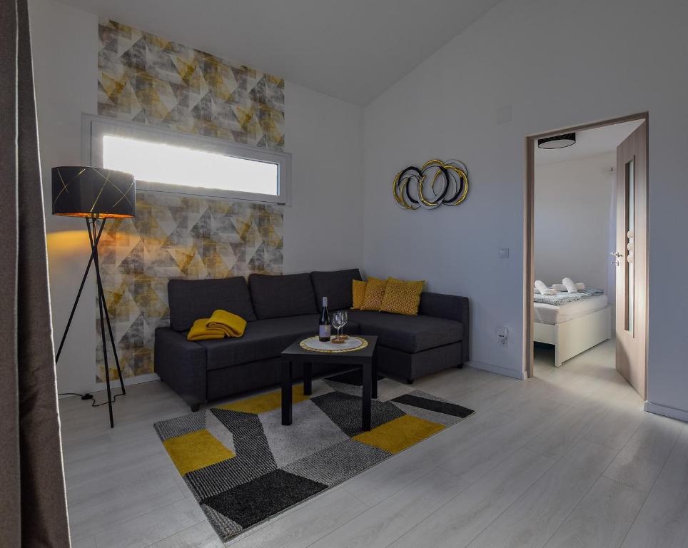 Posezení v ubytování Írisz Apartman