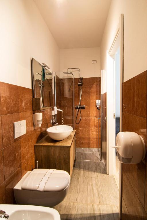 Koupelna v ubytování Hotel Saligari