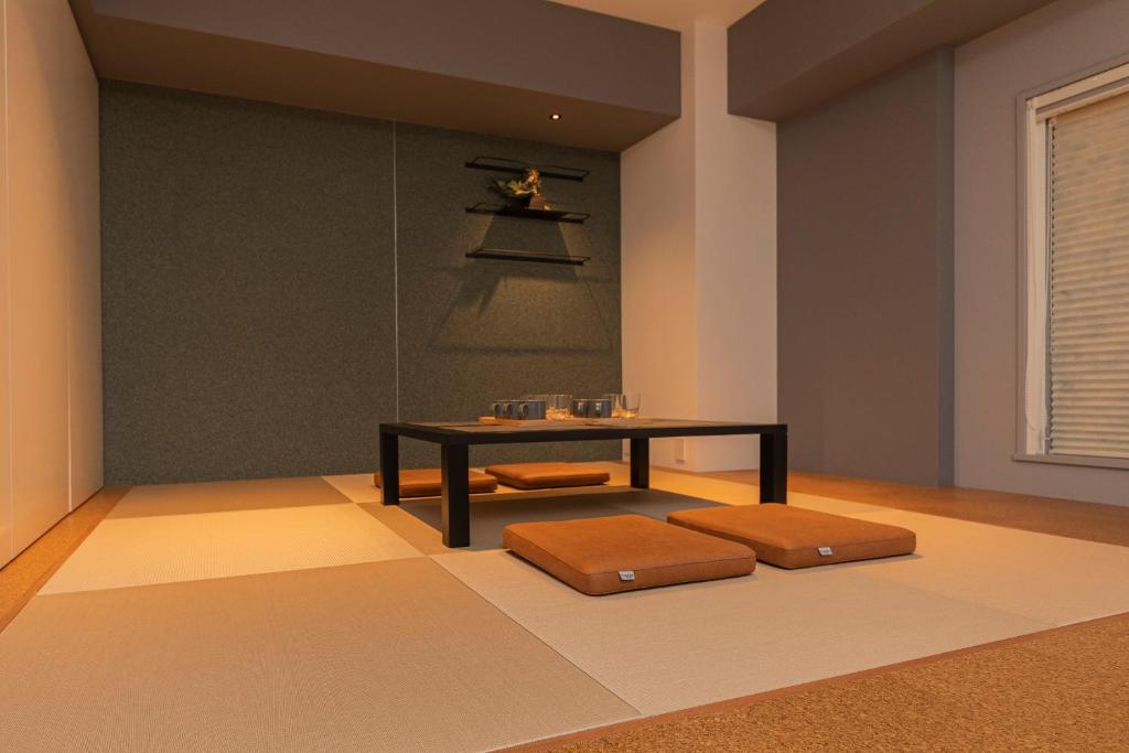 Postel nebo postele na pokoji v ubytování Hotel Keihan Namba Grande