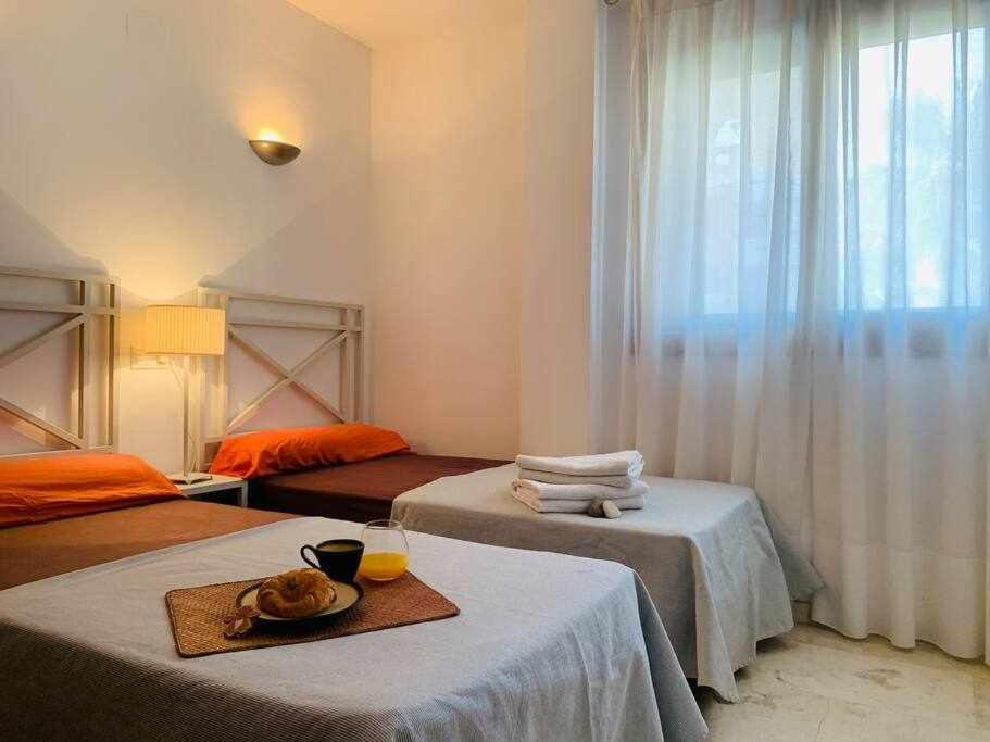 Postel nebo postele na pokoji v ubytování Magnífico apartamento a 500 m de la playa