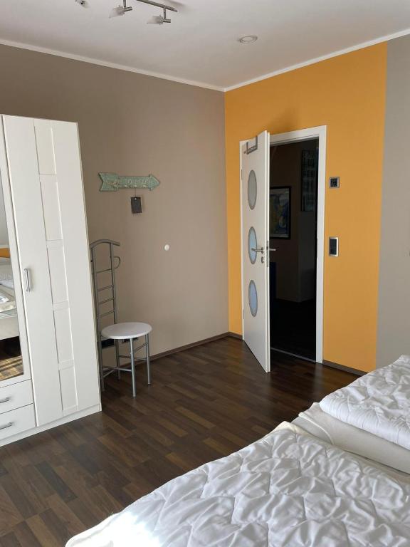 Postel nebo postele na pokoji v ubytování Villa Ostseewelle