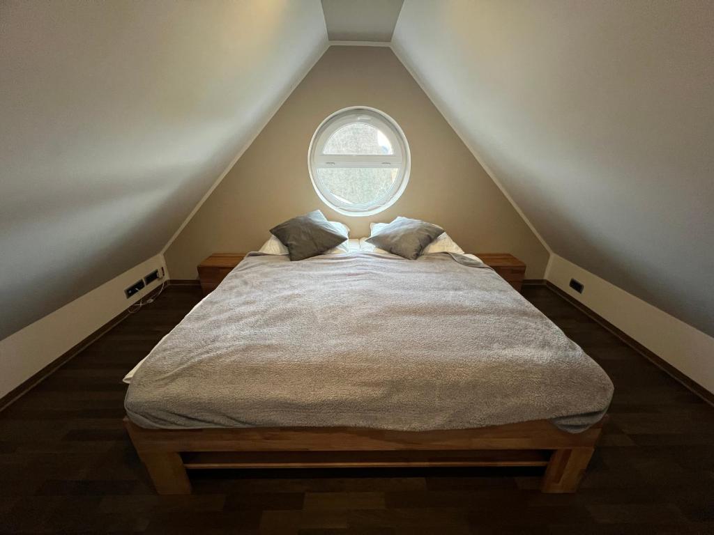 Postel nebo postele na pokoji v ubytování Villa Ostseewelle
